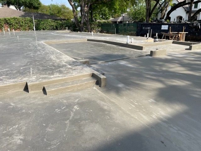 Foundation excavation — Legacy Design Concrete Construction.